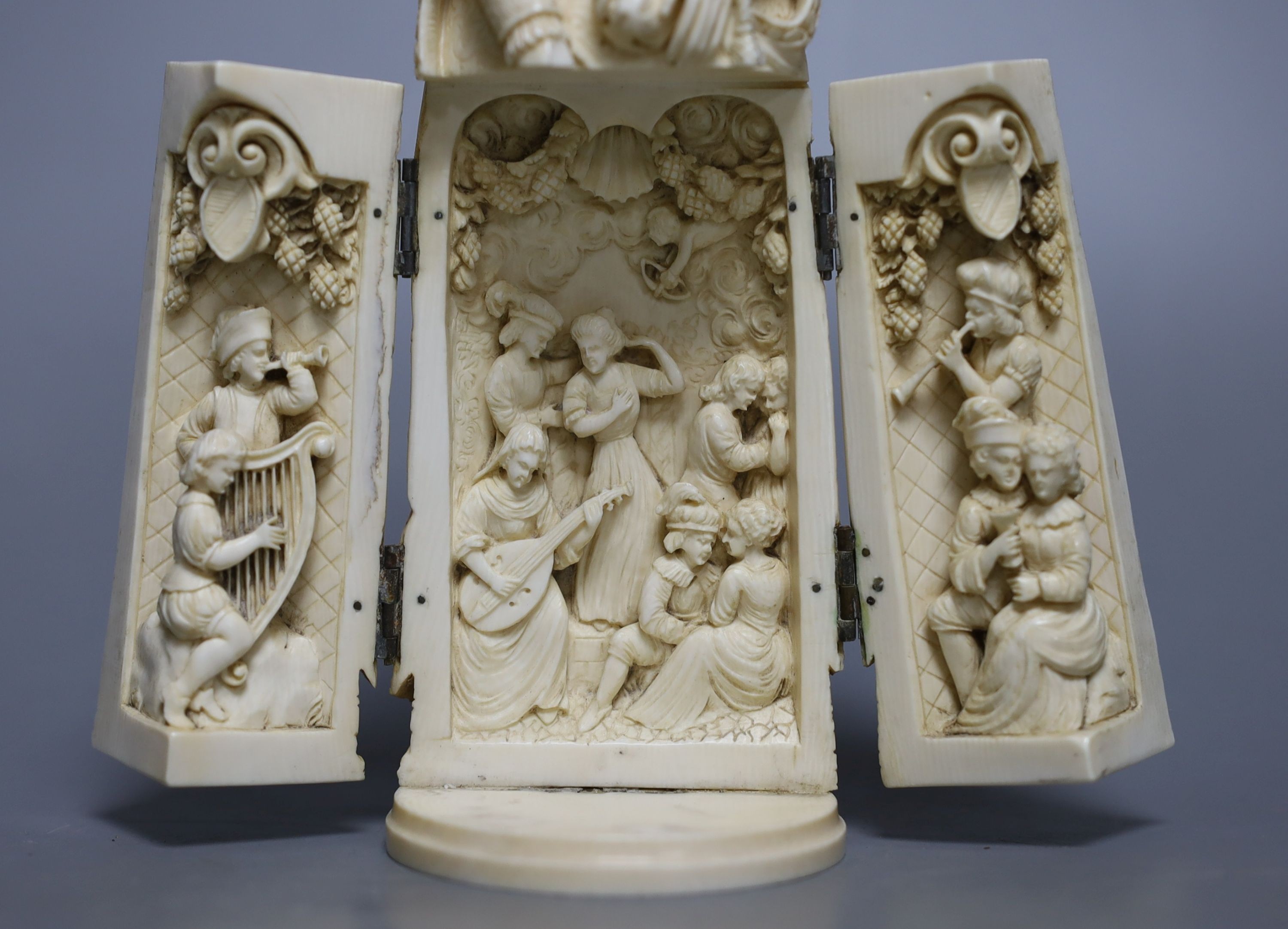 A late 19th century Dieppe ivory triptych figure of Eleanor of Aquitaine, 20cm 21 cm high